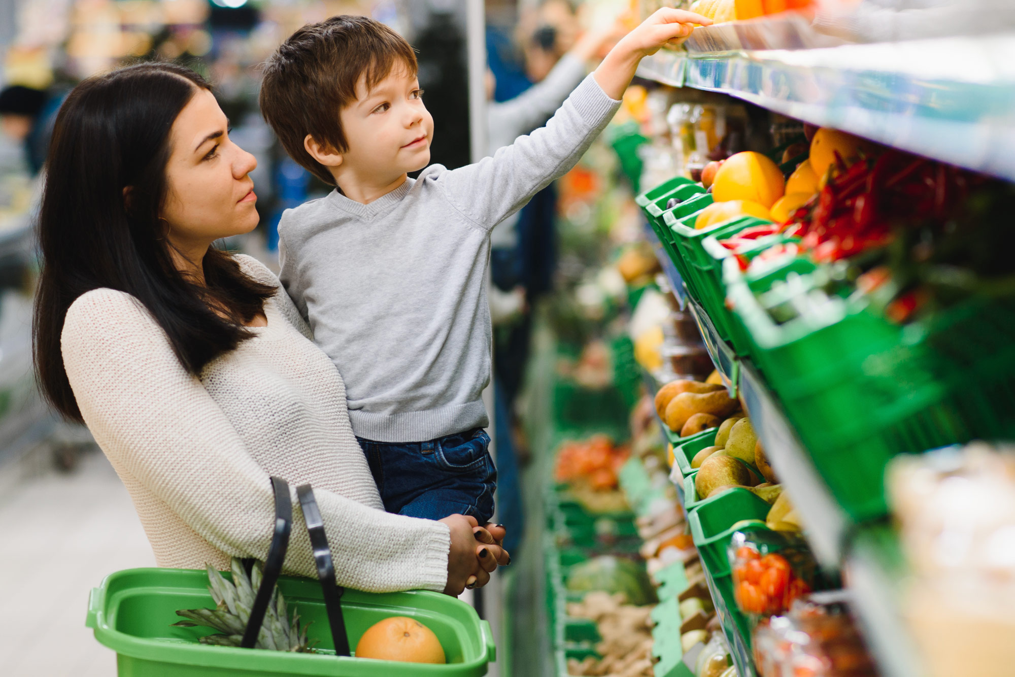 mom son grocery shopping