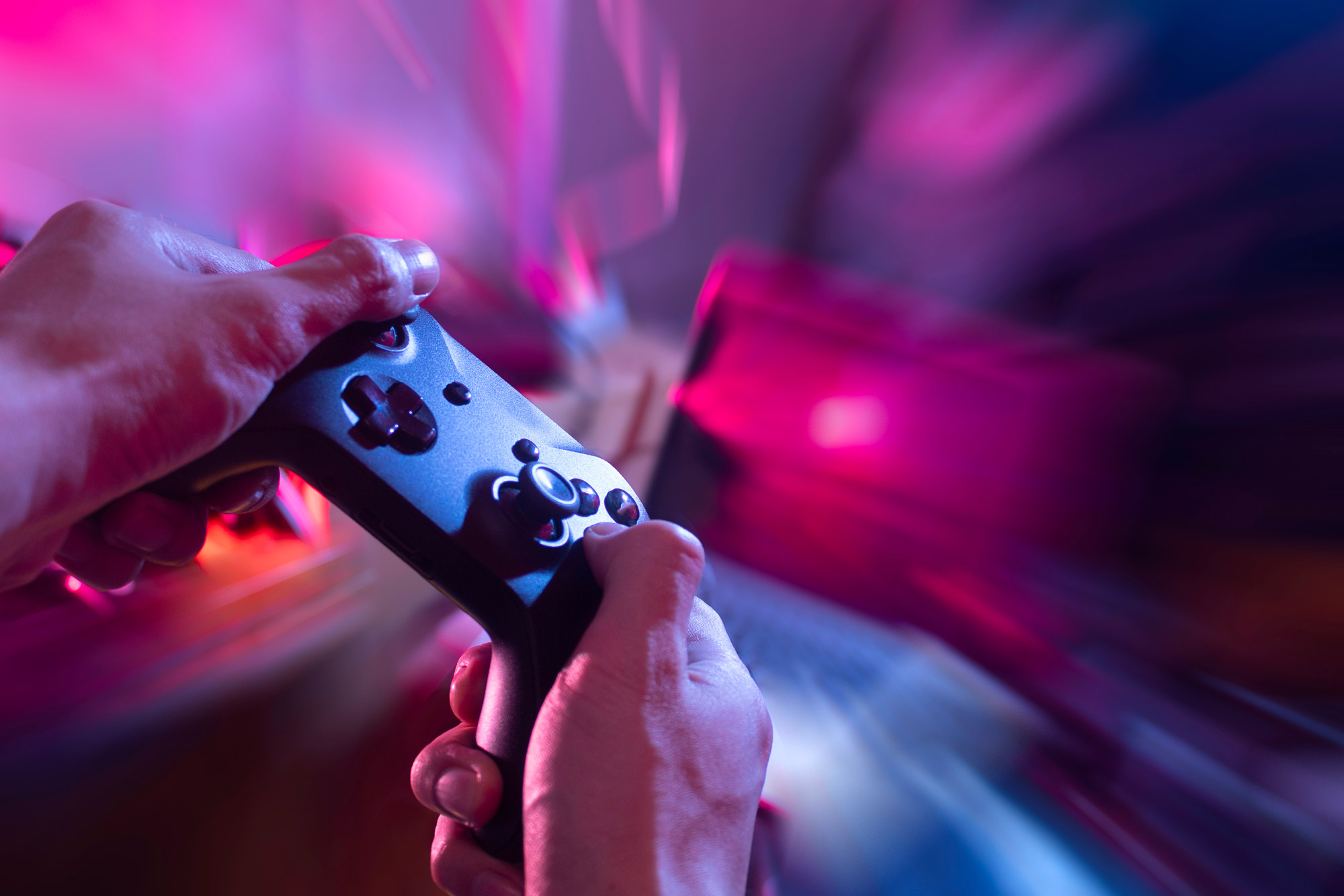 playing video game with controller